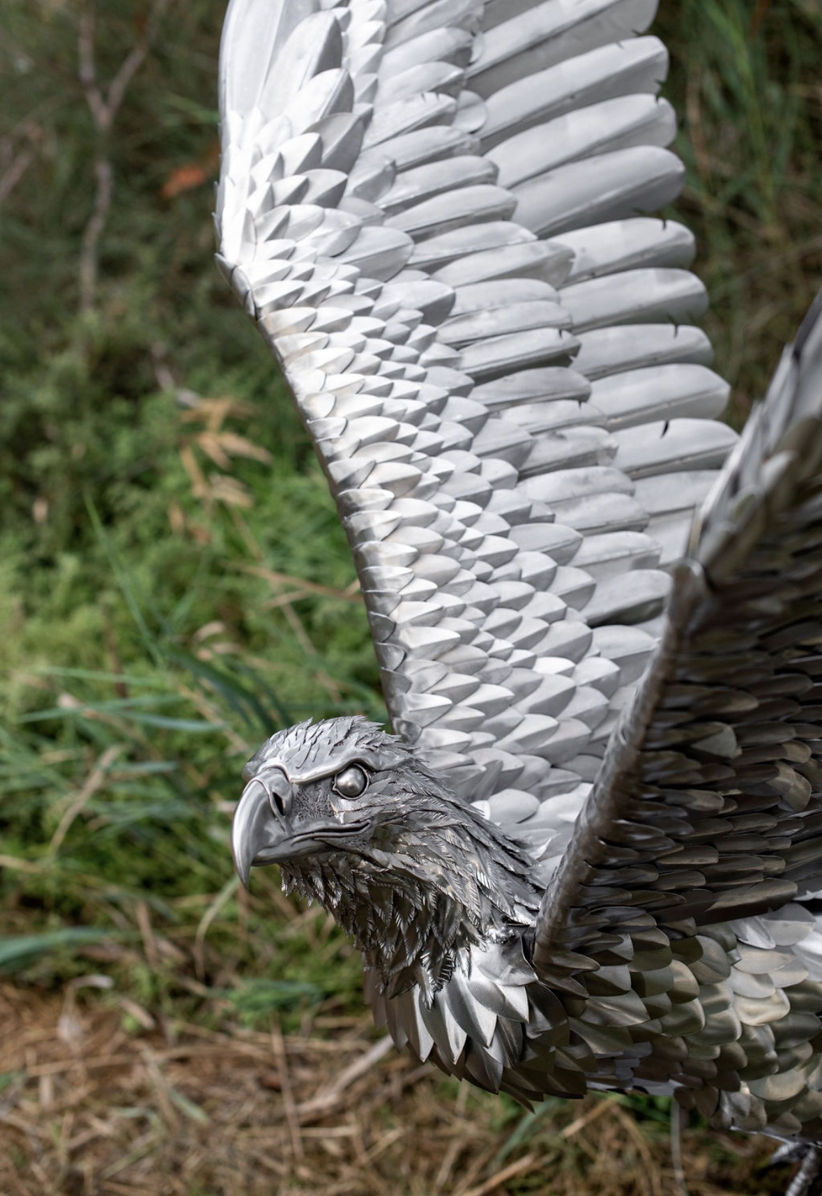 Side view of Ascension with one wing raised, head turned